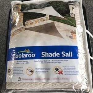 Cool Shade Sail. New in package. 13X13X13. Comes with ropes.